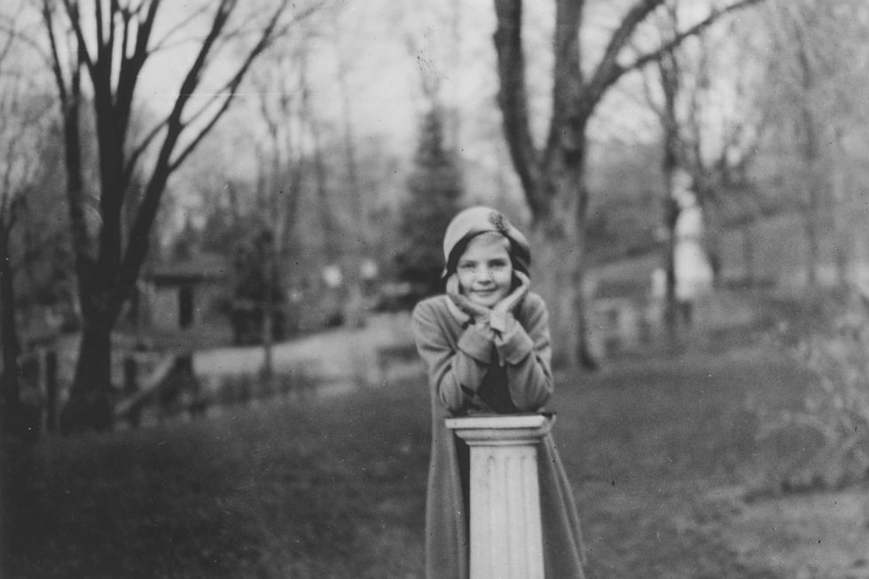 portrait-of-9-year-old-lauren-bacall-leaning-on-a-column.jpg