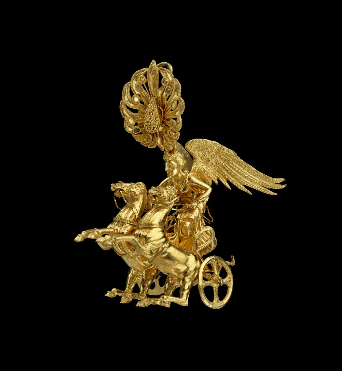 Northern Greek earring with Nike driving a biga (two-horse chariot). Late Classical or Early Hellenistic Period, about 350–325 BC..jpg