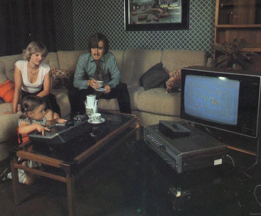 Home entertainment, circa 1978. That's the first ever model VCR (JVC HR-3300). The little girl is playing the Magnavox Odyssey 2 video game system.jpg