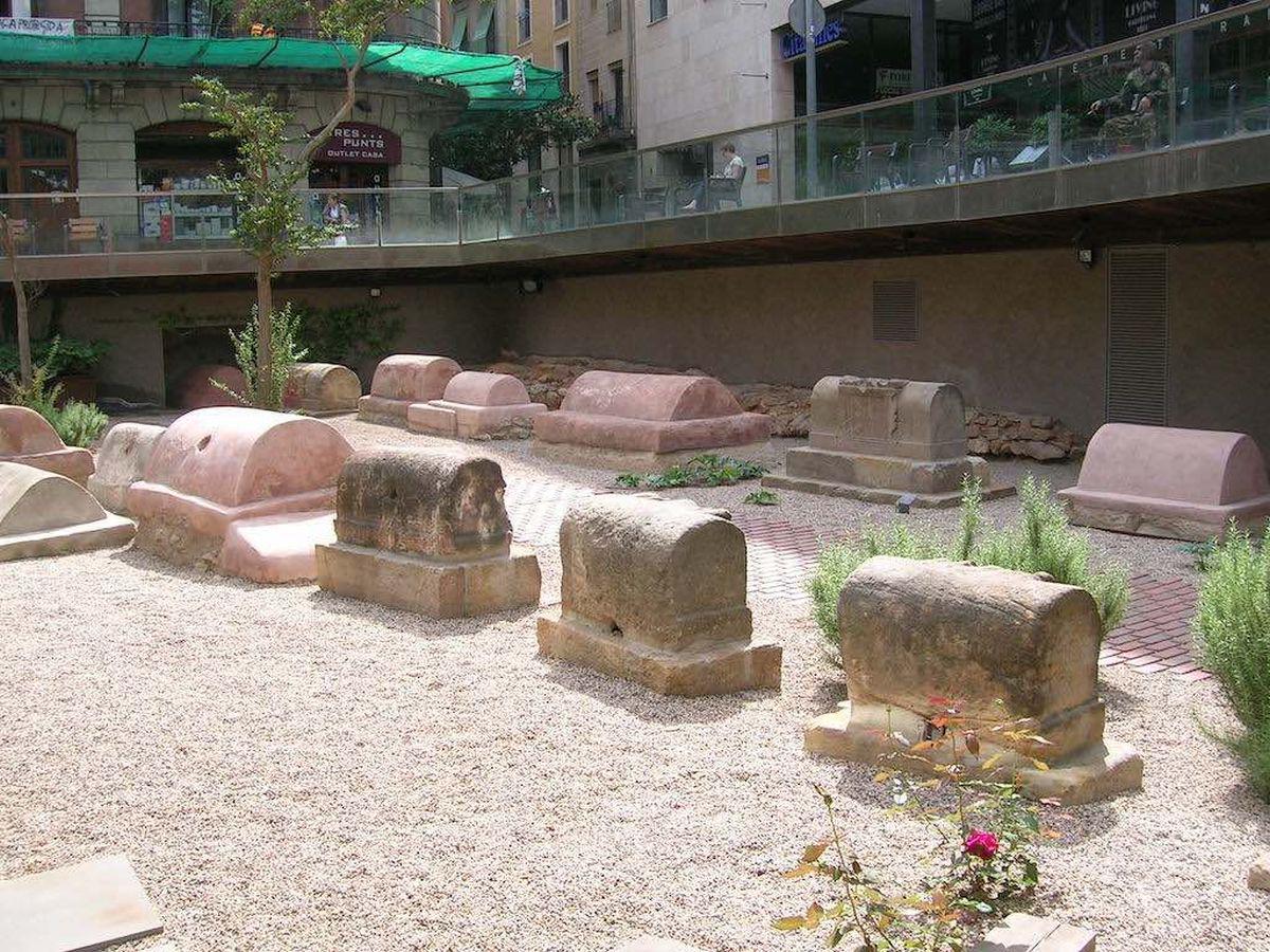 Preserved Roman tombs with visible openings for sharing food with the deceased.jpg