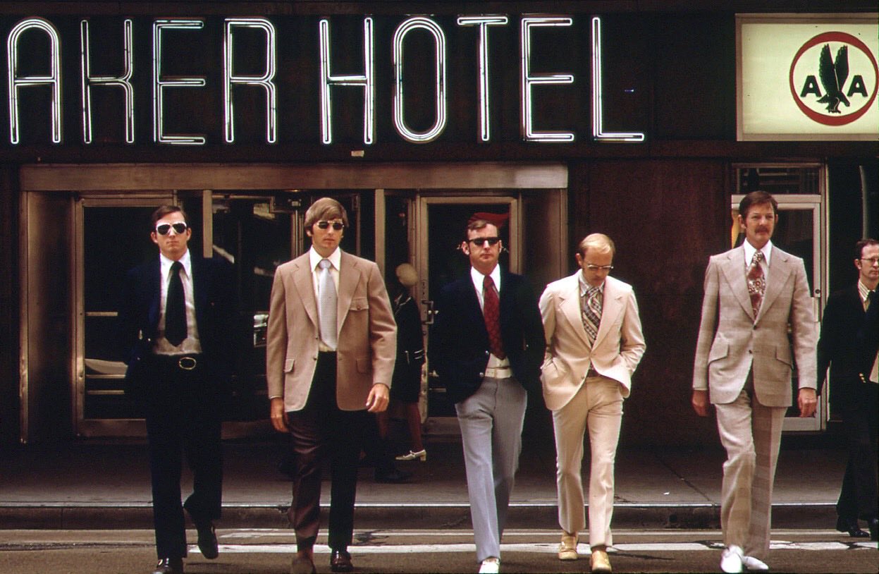 1972 photo of businessmen crossing the street on their lunch break in downtown Dallas, Texas.jpg