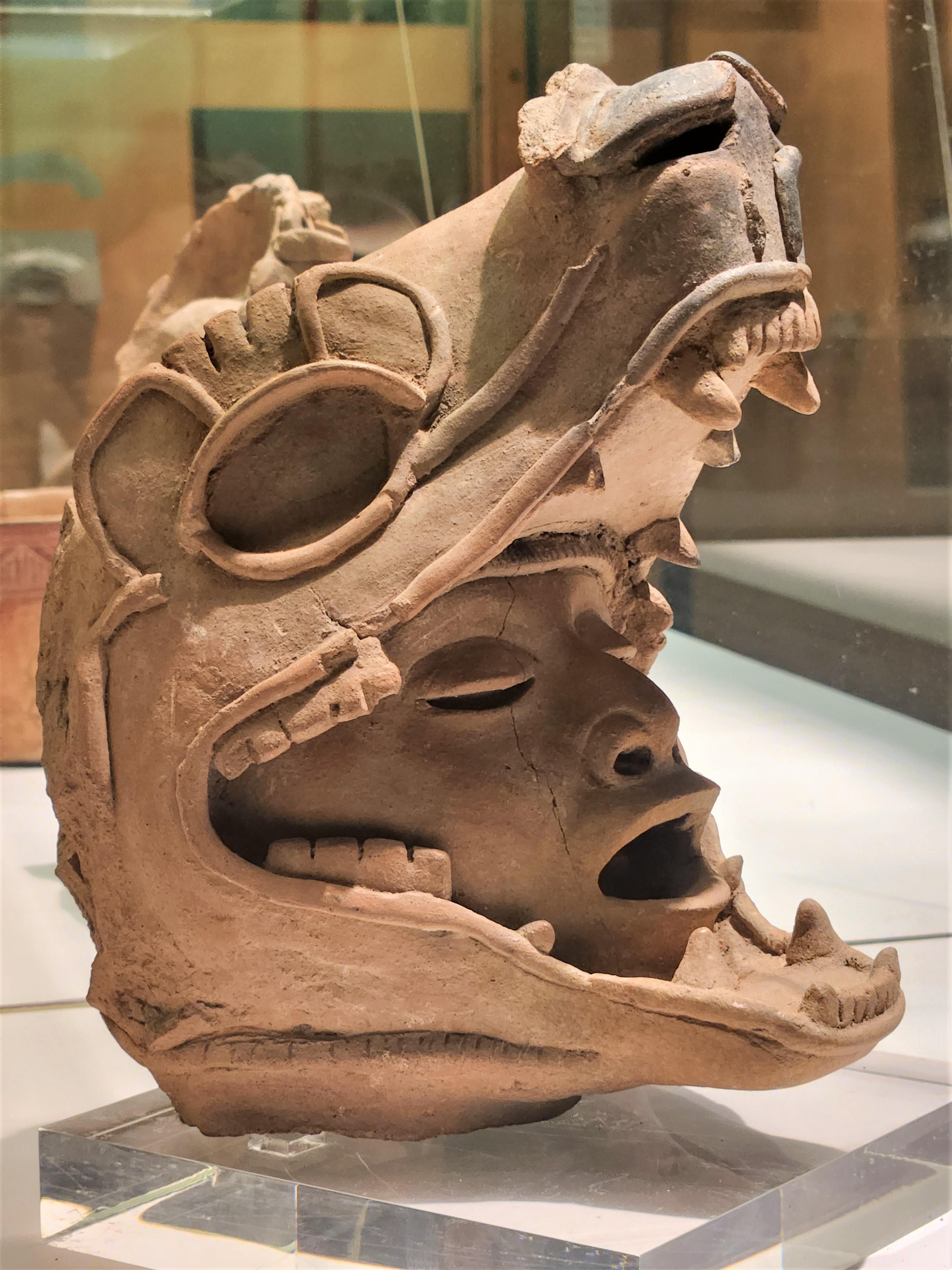 Terracotta head in jaguar's jaws. Veracruz, Mexico, Late Classic period, Remojadas style, ca. 600-800 AD. American Museum of Natural History collection.jpg