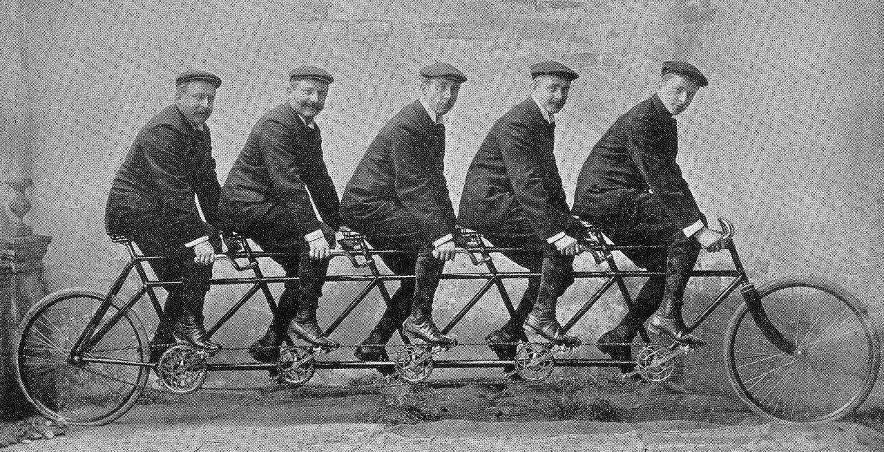 The Opel brothers ( Carl, Wilhelm, Heinrich, Fritz and Ludwig) on a tandem bicycle, 1912.jpg