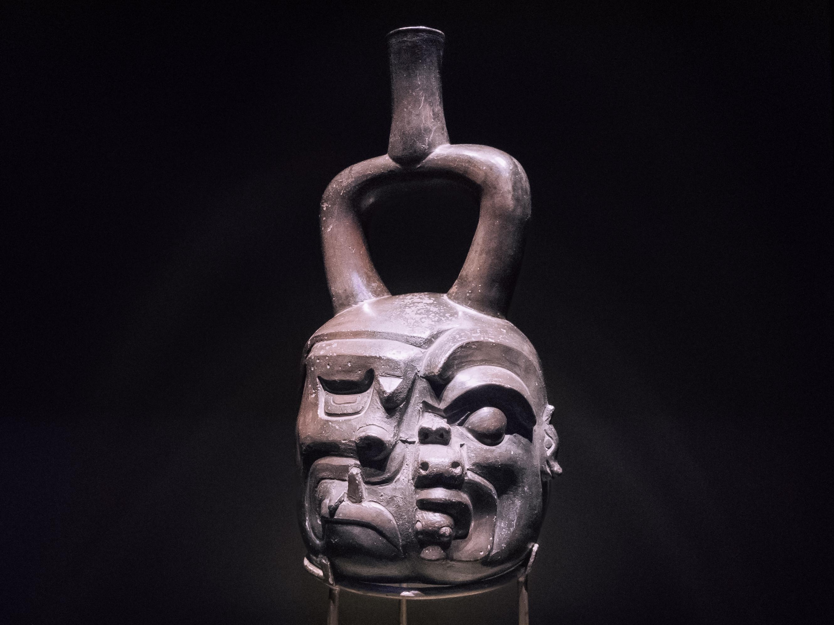 A Shaman in the middle of transformation  into a jaguar. Cupisnique culture (1.250-100 BCE), ceramic stirrup-spout bottle, Larco Museum, Lima.jpg