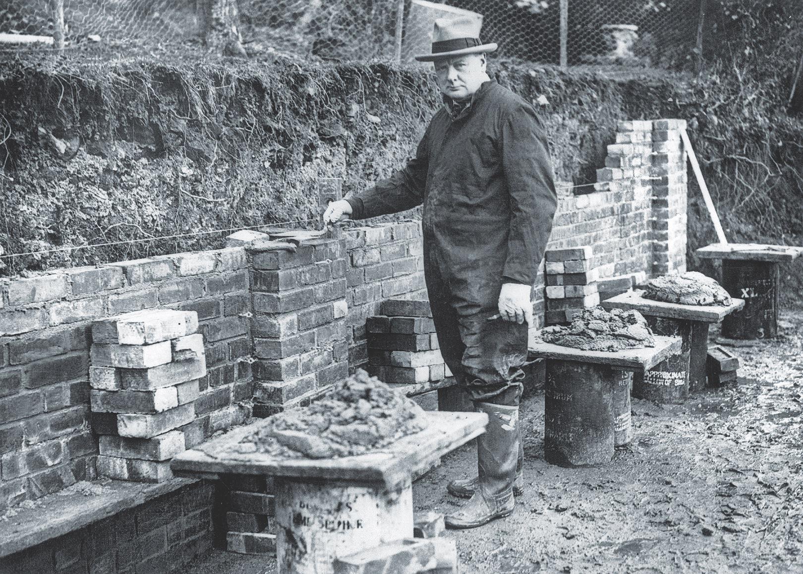 Winston Churchill, among other things an accomplished bricklayer, building a cottage for his daughters at his Chartwell estate in Kent (1928).jpg