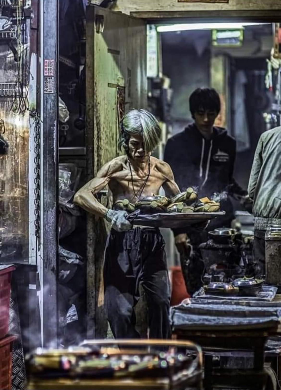 Somewhere in Hong Kong - Waiter of a traditional restaurant.jpg