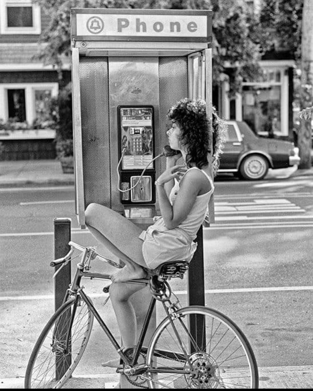 Diane on the pay phone. 1980's. City Island. The Bronx, New York. Photo by Ron Terner.jpg