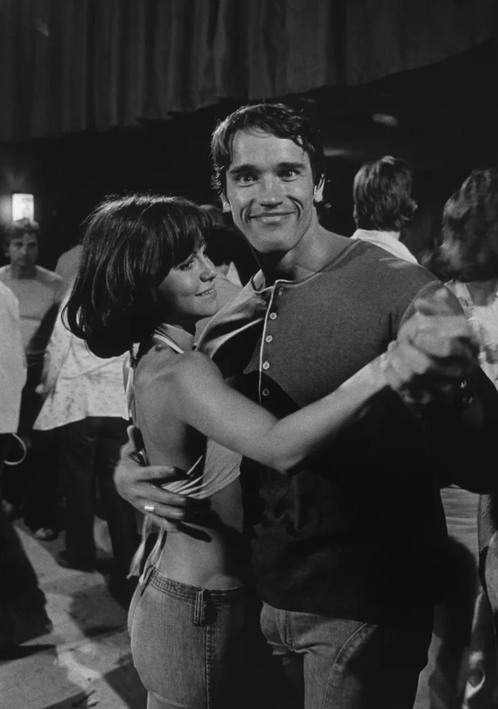 Arnold Schwarzenegger with Sally Field on the set of Stay Hungry in Birmingham, Alabama, 1975.jpg
