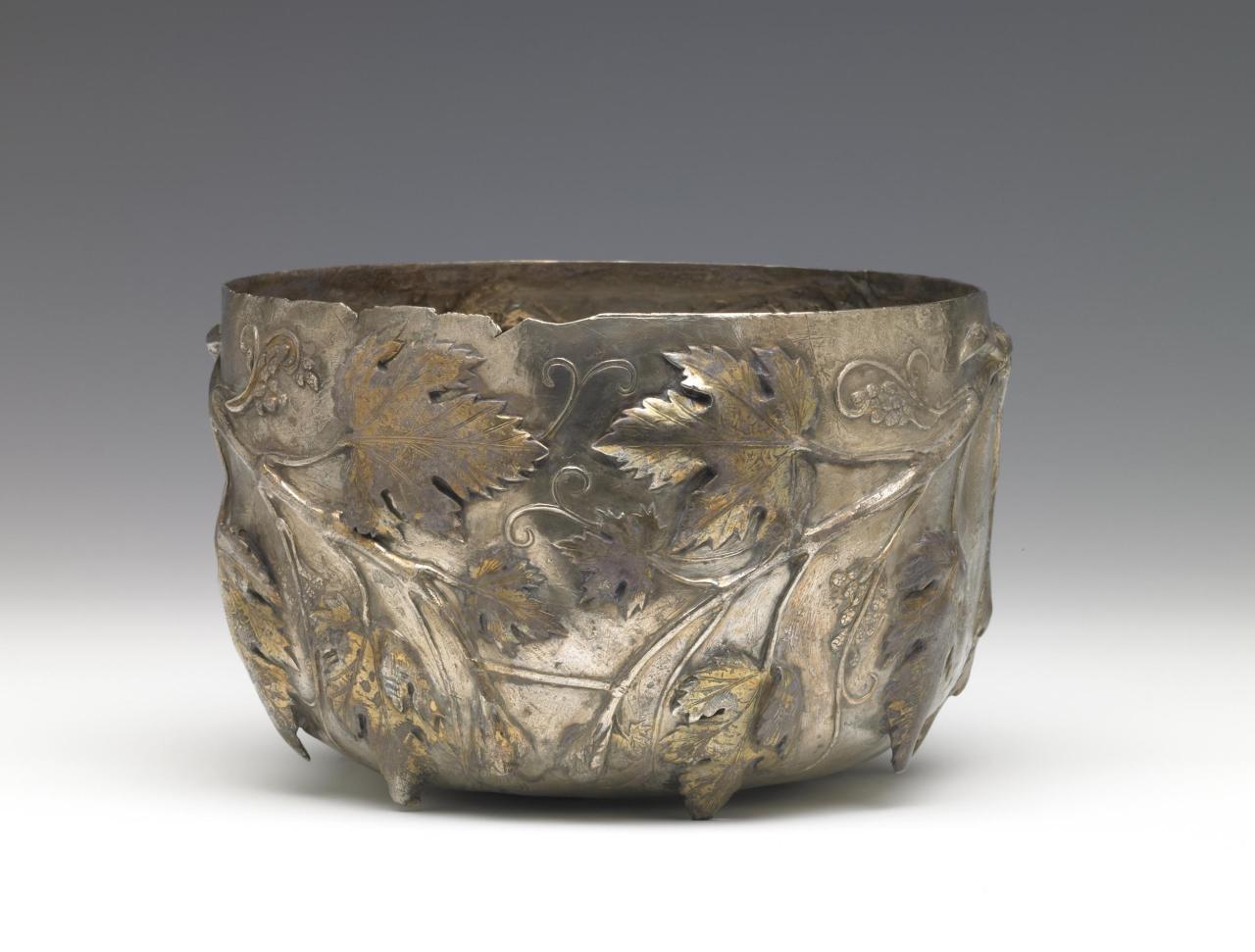 Silver Bowl decorated in repoussé with gilded leafy vines. Roman, AD 1-50.jpg