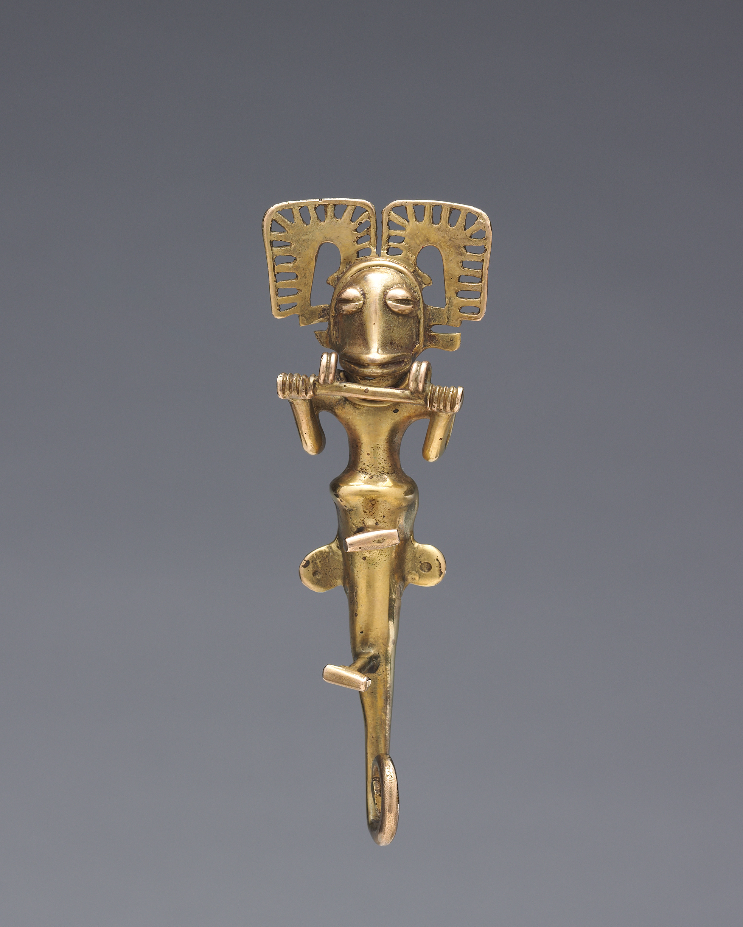 Ancient gold pendant featuring a figure with the face of a fish discovered in Panama, c. 5th-7th century CE.jpg