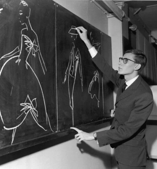 Yves Saint Laurent creating chalk illustrations for Christian Dior, 1960.png