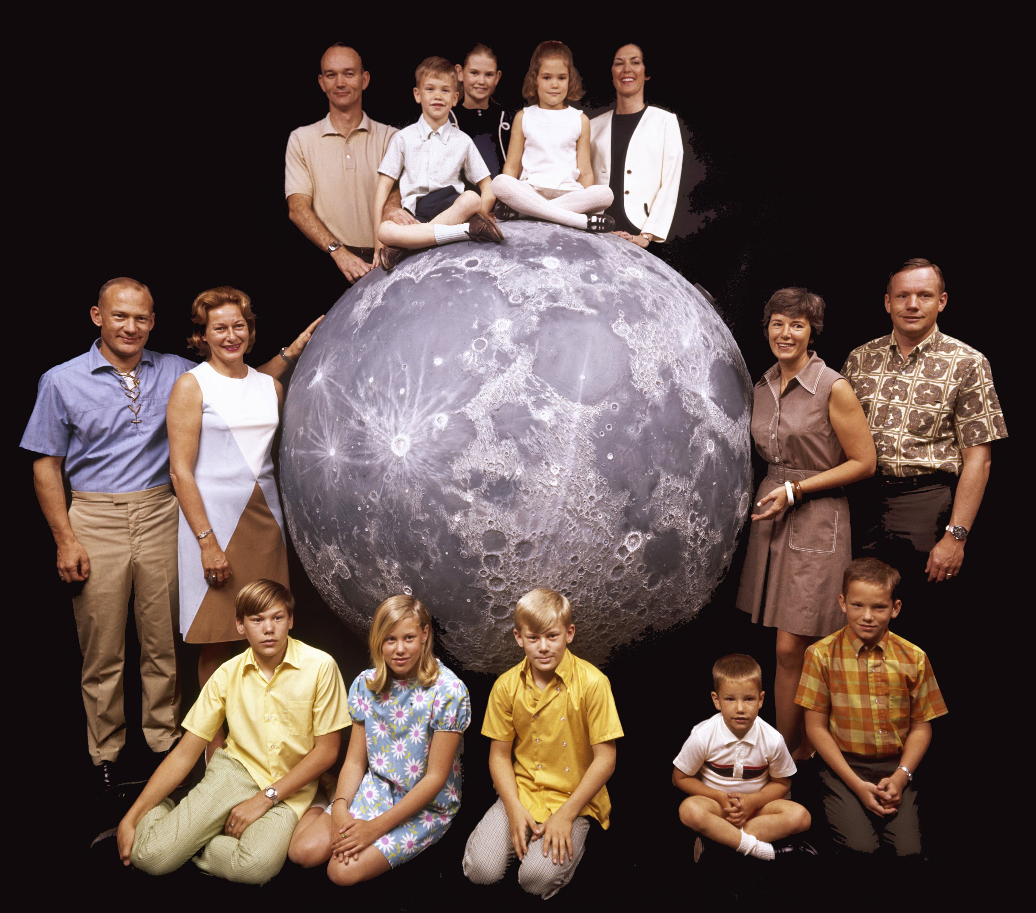 NASA astronauts Michael Collins, Buzz Aldrin, and Neil Armstrong with their families, four months before Apollo 11 launched from Cape Kennedy, 1969.jpg
