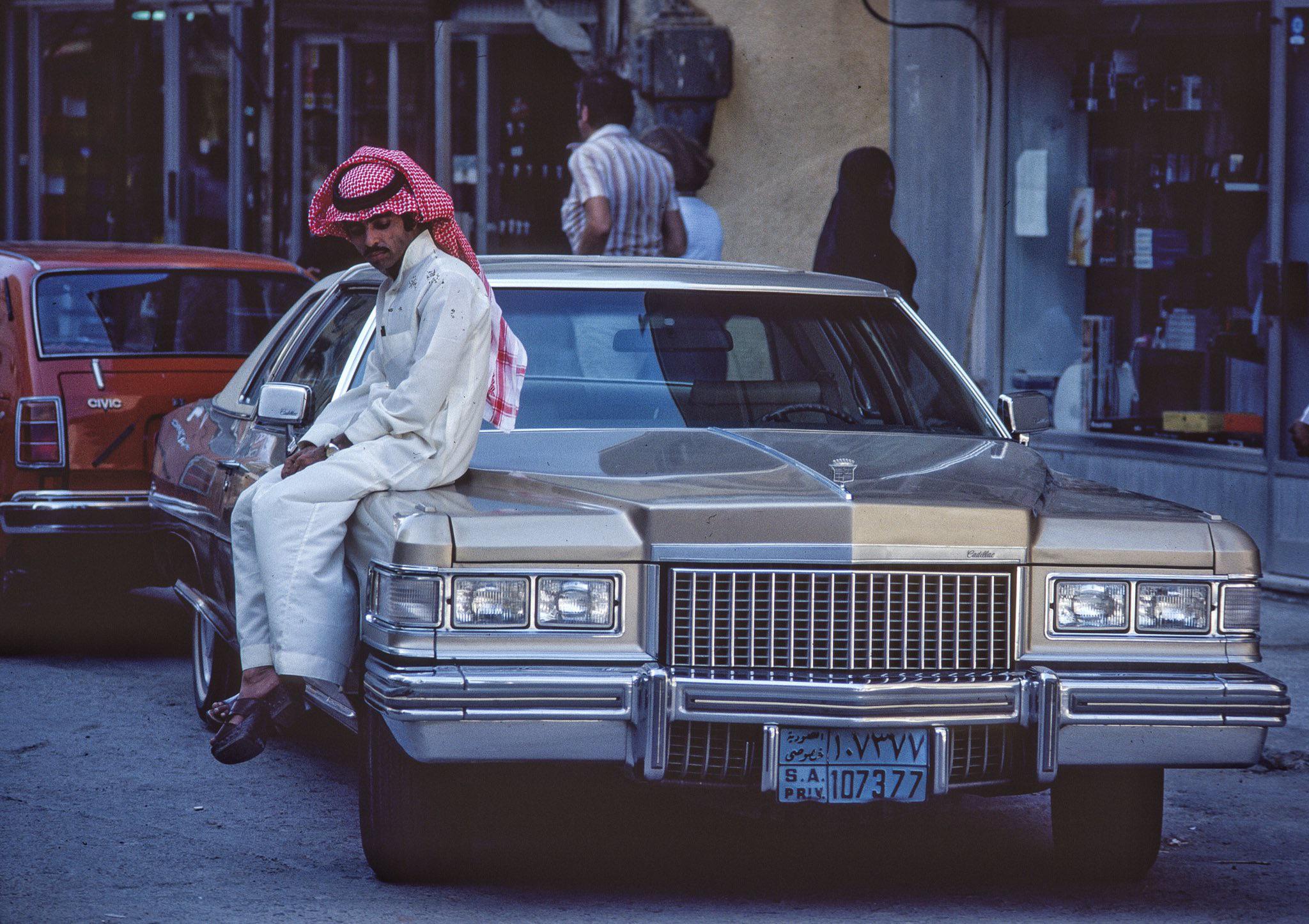 Mo sitting shotgun on the Cadillac, Jeddah, Saudi 1979.jpg