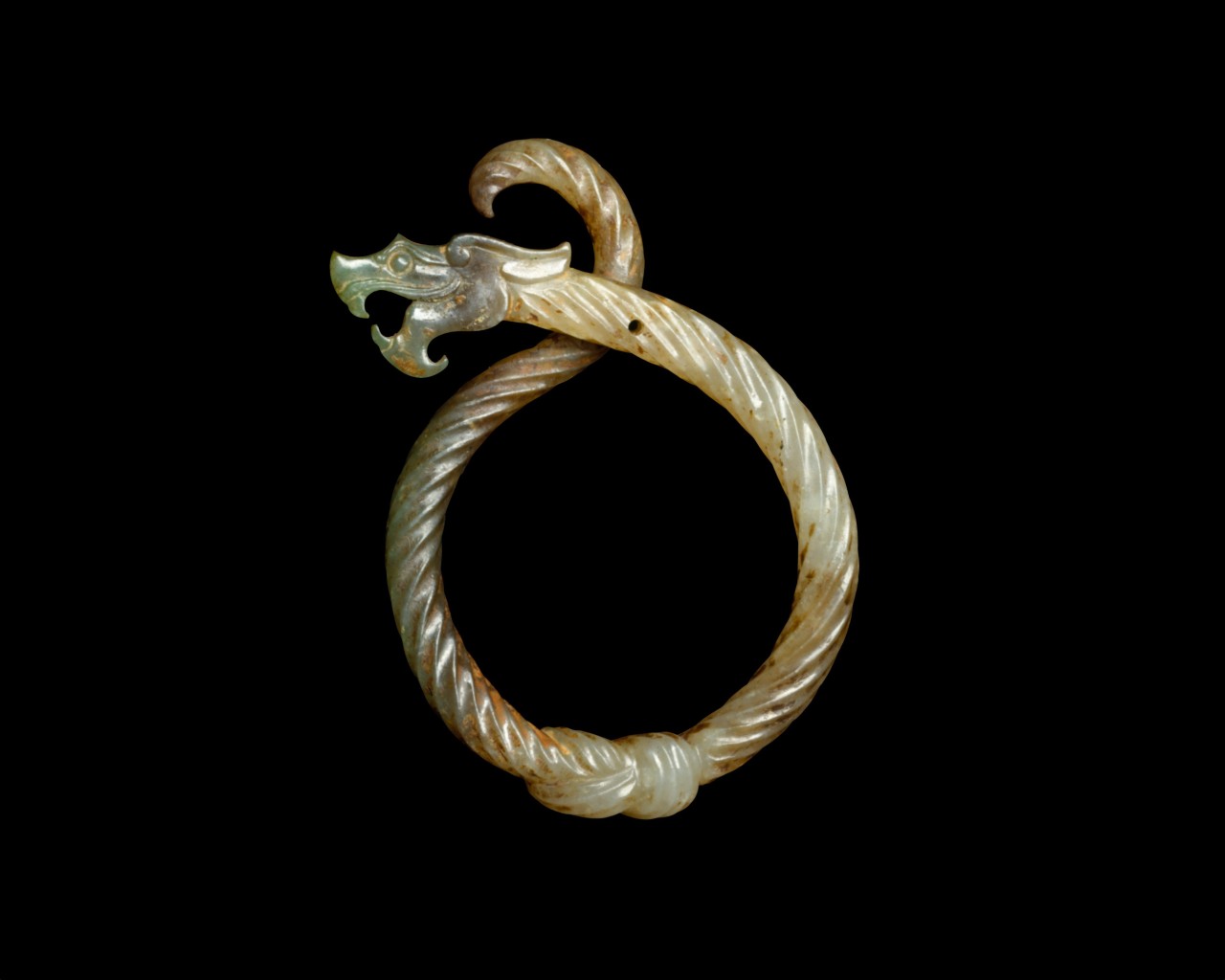 A carved jade Chinese pendant from the 3rd century BC. The Metropolitan Museum of Art.jpg
