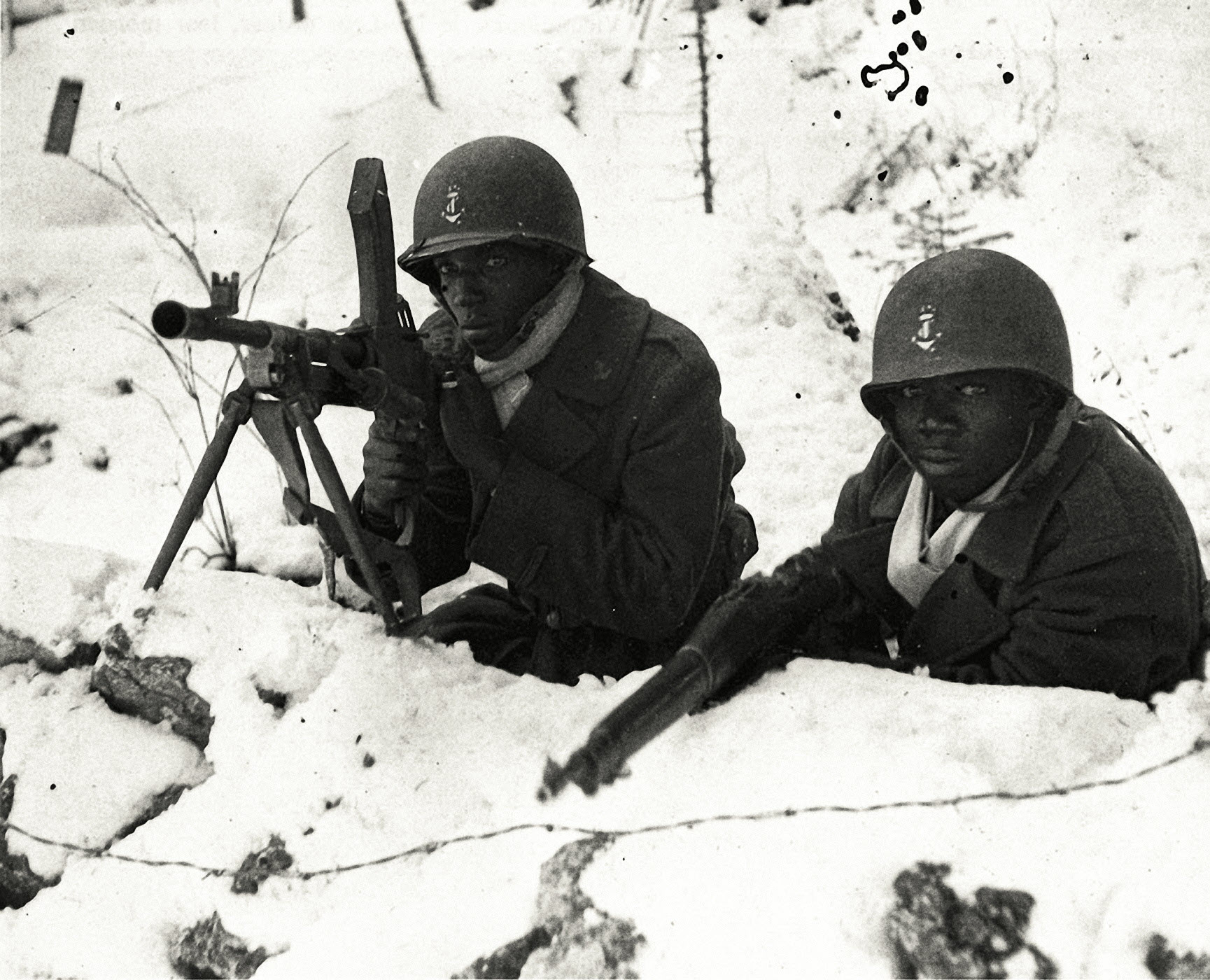 WWII Senegalese French troops wearing American helmets, holding a position with a British Bren and an American 1903 Springfield, at Boucle du Doubs, France, 1944.jpg