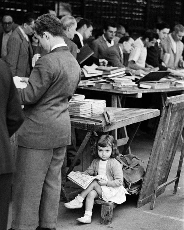 Reading at the San Antonio market in Barcelona. c. 1955.jpg