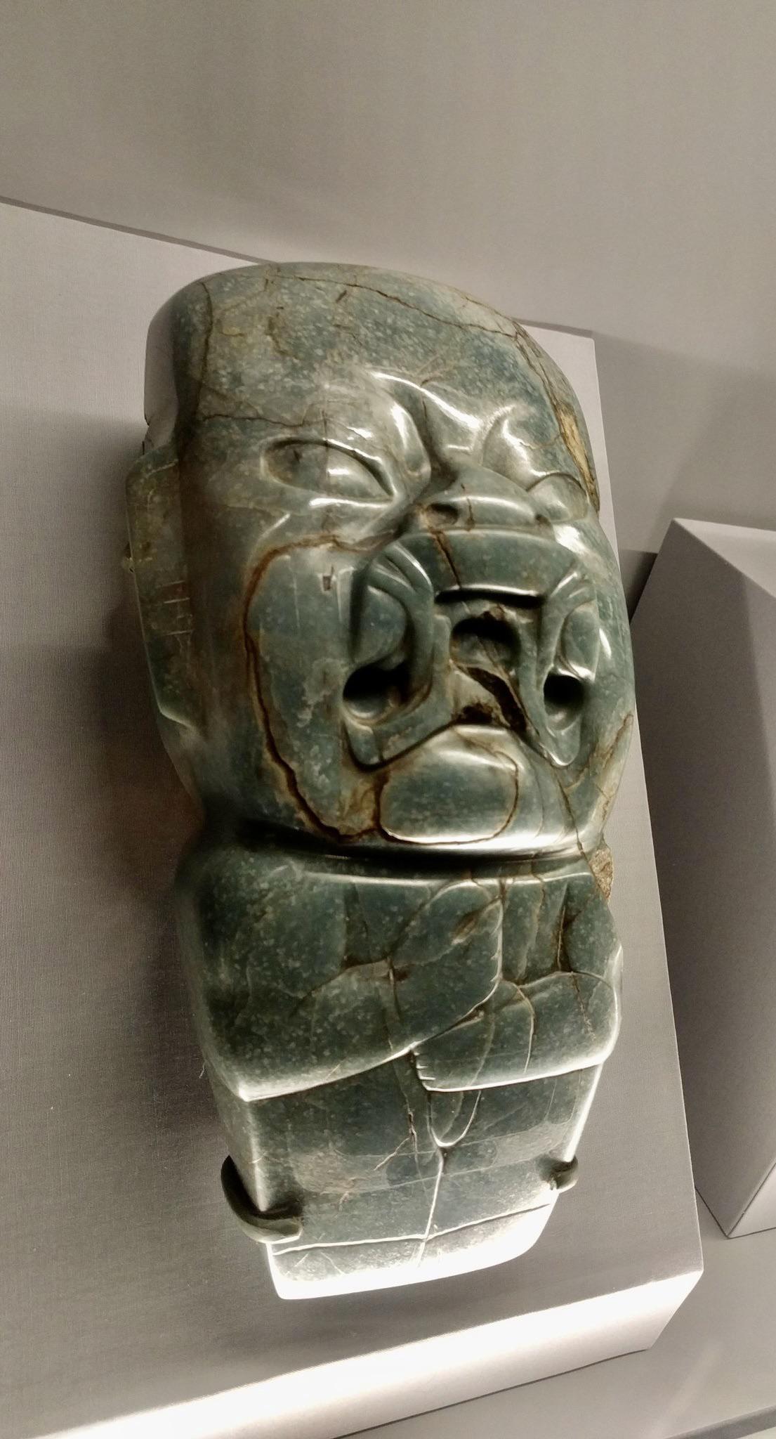The Kunz Axe, likely only used ceremonially or was deposited in a grave. Crafted in a typical Olmec style from jadeite, the axe was found in the state of Oaxaca in Mexico. 1200-400 BCE.jpg