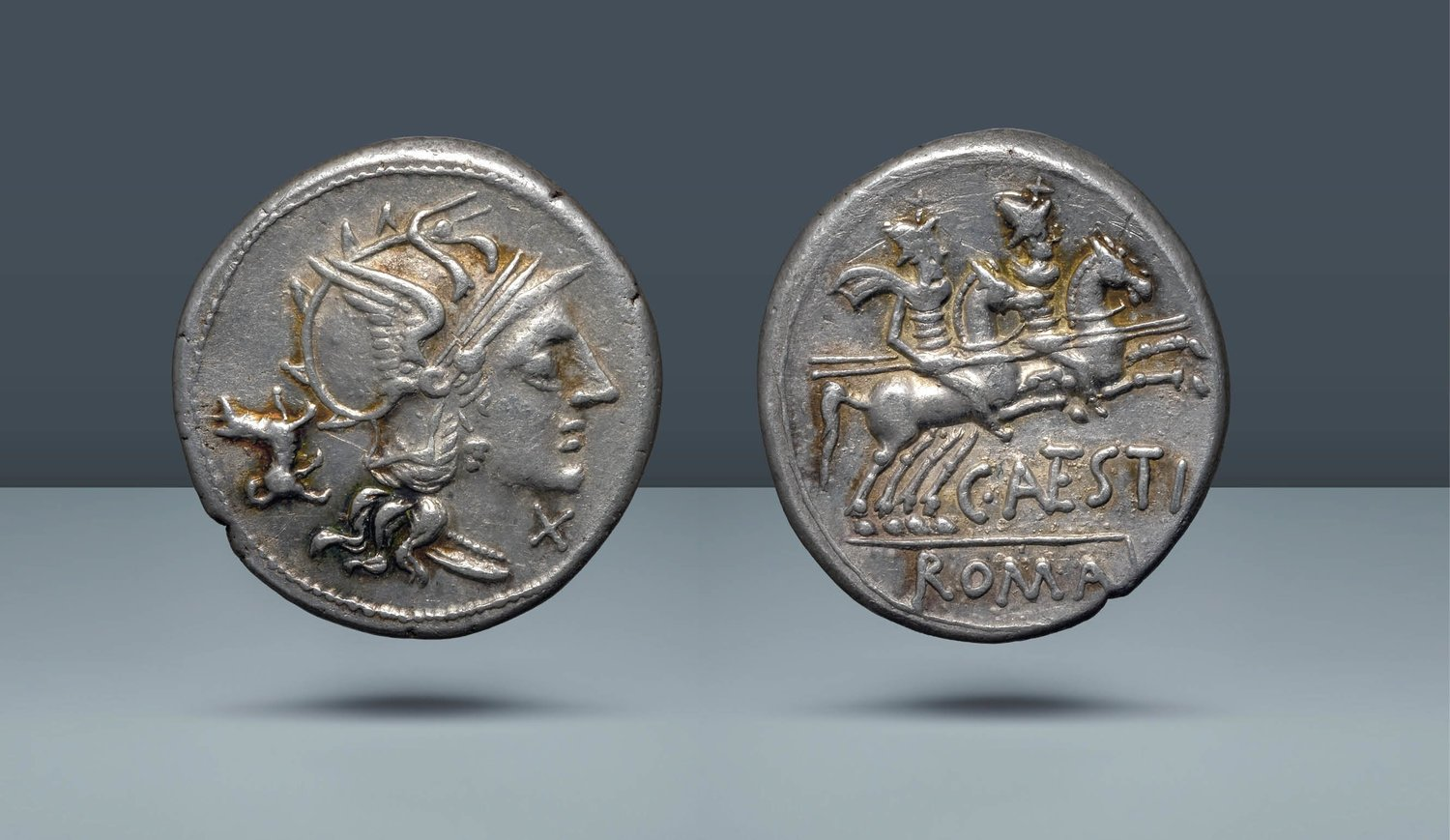 Ancient Rome Denarius of 146 BC - On Left Rome And Small Dog And Right Dioscuri On Horse.png