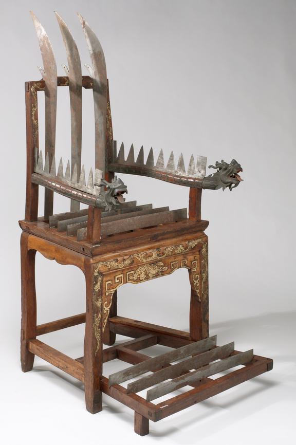 Wooden chair set with 12 steel blades, Chinese, 1701-1900, formerly thought to be a torture chair.jpg