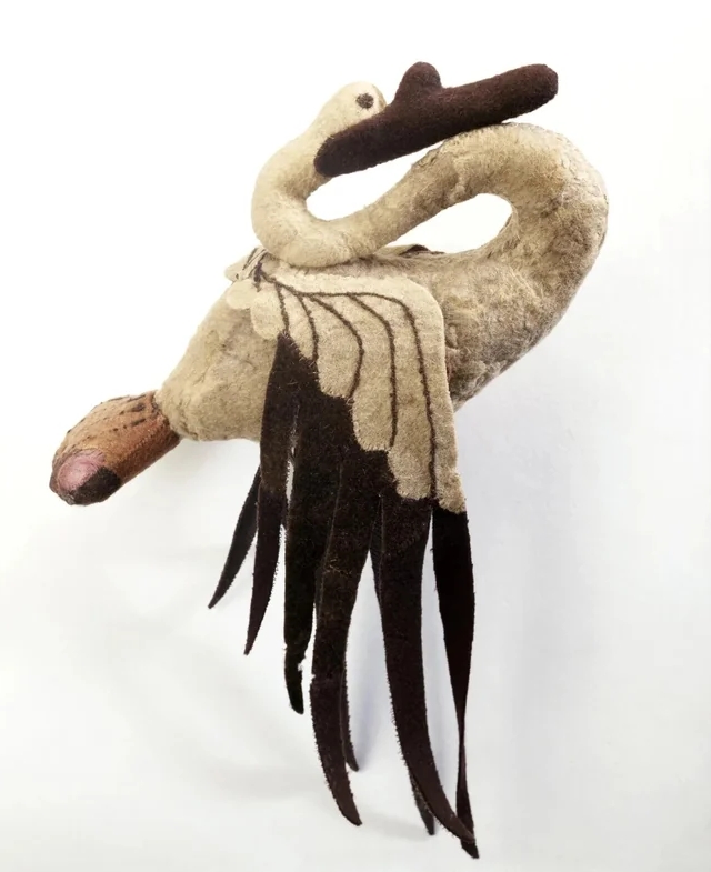 2,300-Year-Old Plush Bird from the Altai Mountains of Siberia (c.400-300 BCE) - this artifact was crafted with a felt body and reindeer-fur stuffing, all of which remains intact.jpg