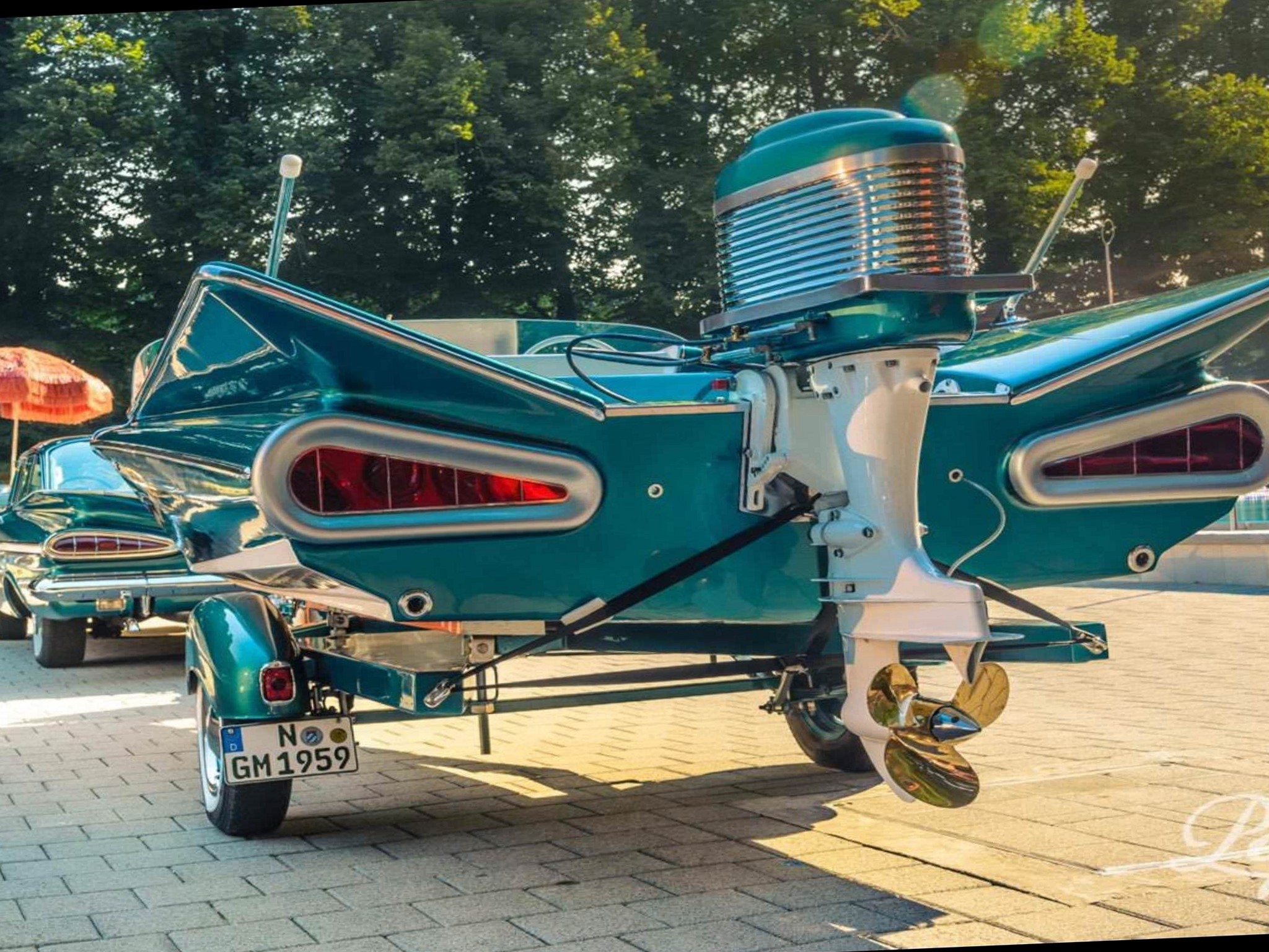 1958 Chevy Impala with matching motor boat.jpg