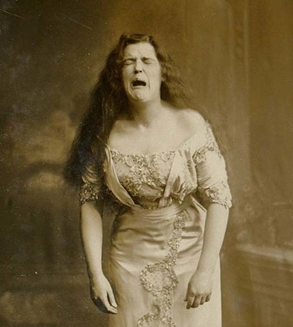 A portrait taken of a woman while she was mid-sneeze (1900).jpg
