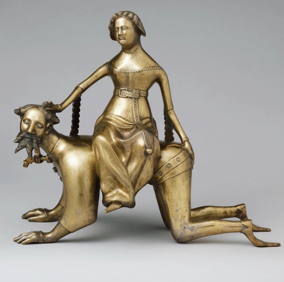 Phyllis, the powerful wife of Alexander the Great’s father, rides the philosopher Aristotle. A water vessel used for washing hands, made in the Netherlands in the late 130.png