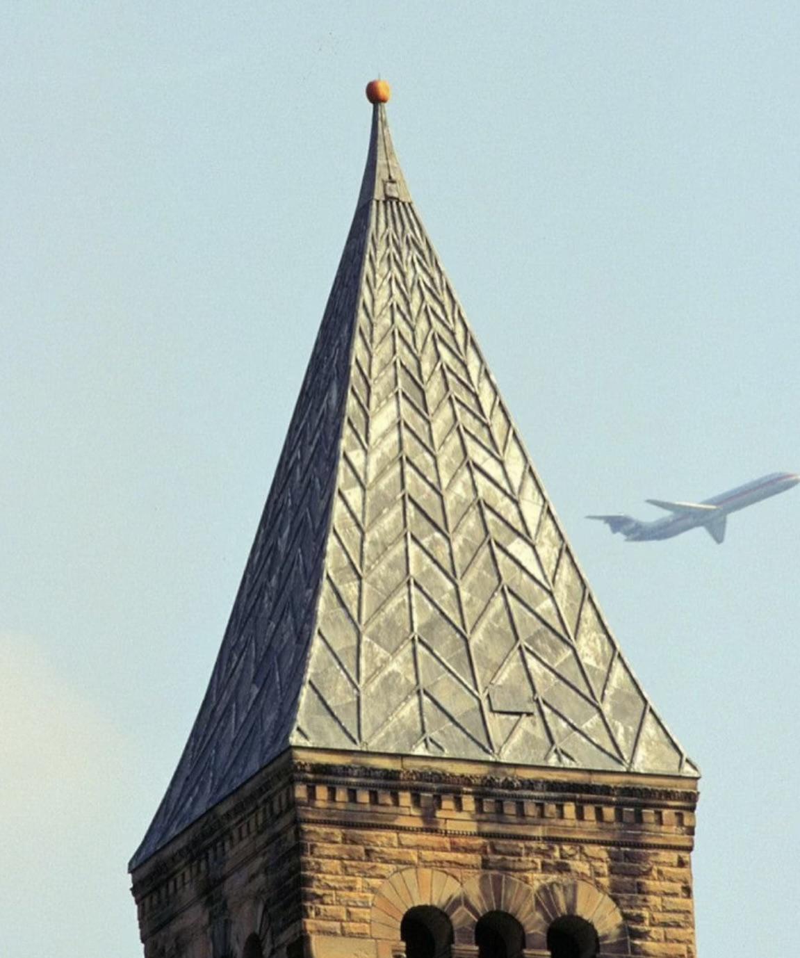 Pumpkin mysteriously impaled atop spire at Cornell University.jpg