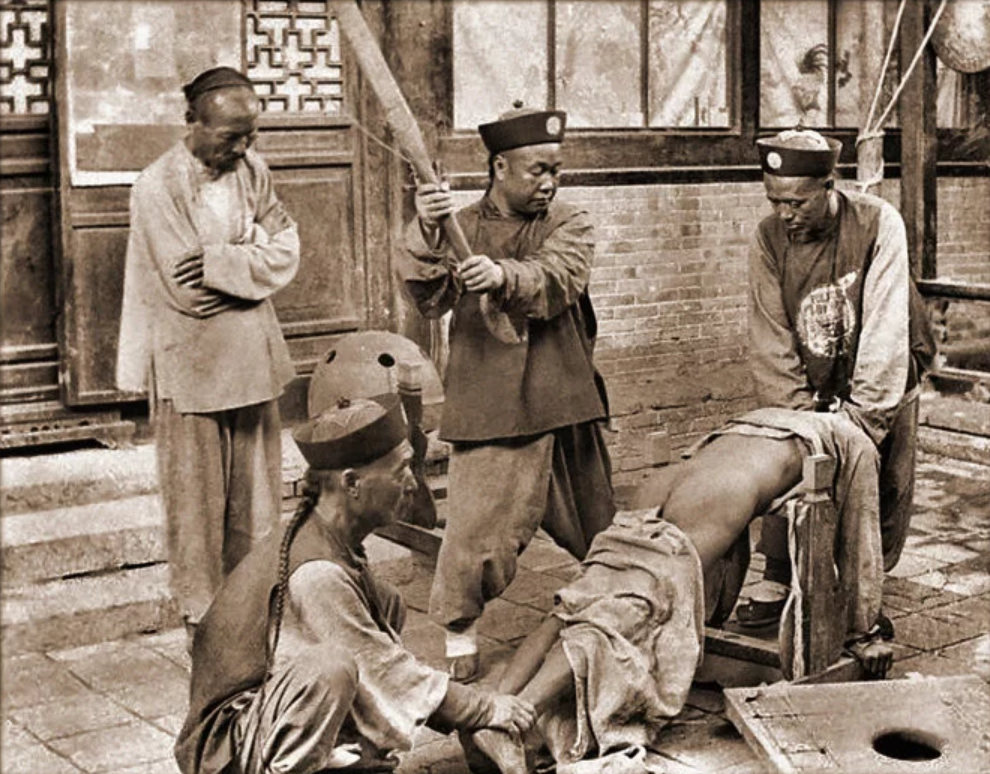 Chinese Punishment, Whipping A Lawbreaker [c 1900].png