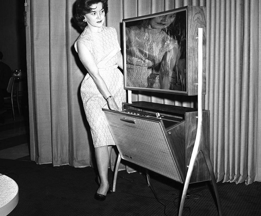 A thin TV screen with a timing device to record TV programs for later viewing shown at the Home Furnishings Market in Chicago, Illinois, on June 21, 1961.jpg