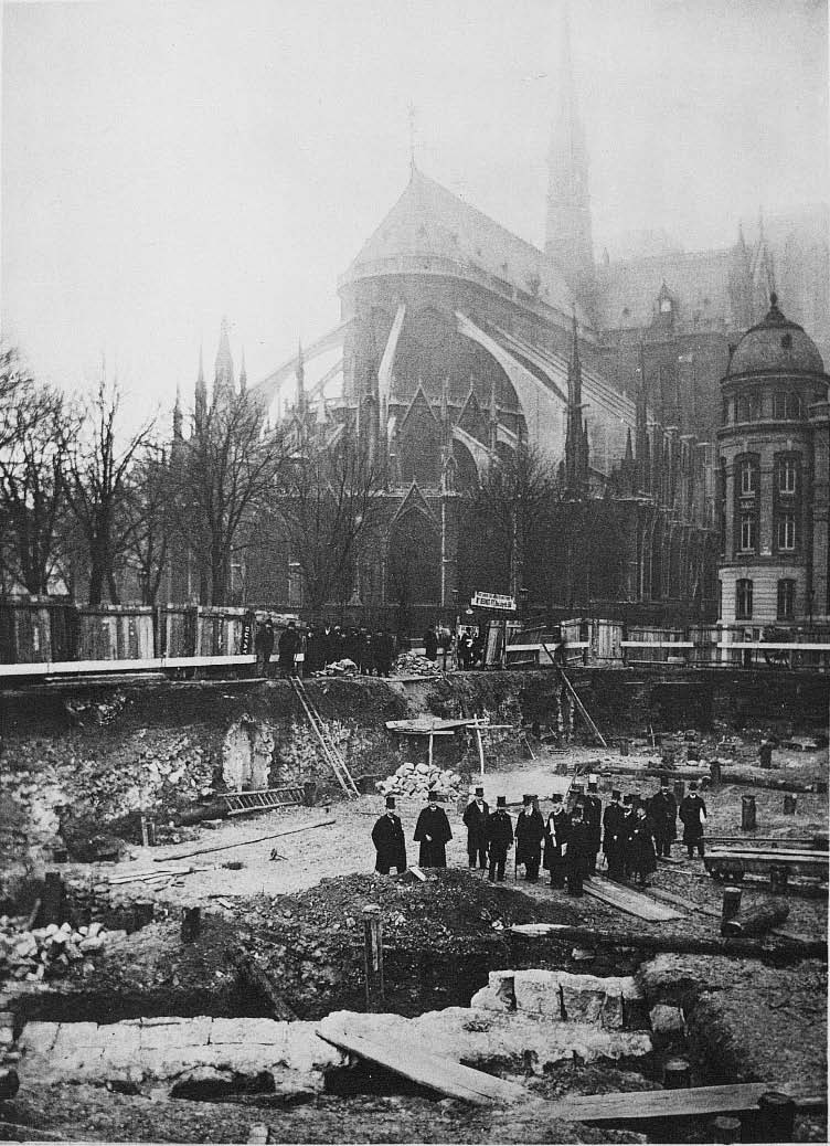 Archeological excavation in 1898, over the ruins of Lutetia Parisiorum, the Gallo–Roman town predating the city of Paris. Close by the Notre-Dame cathedral rises.jpg