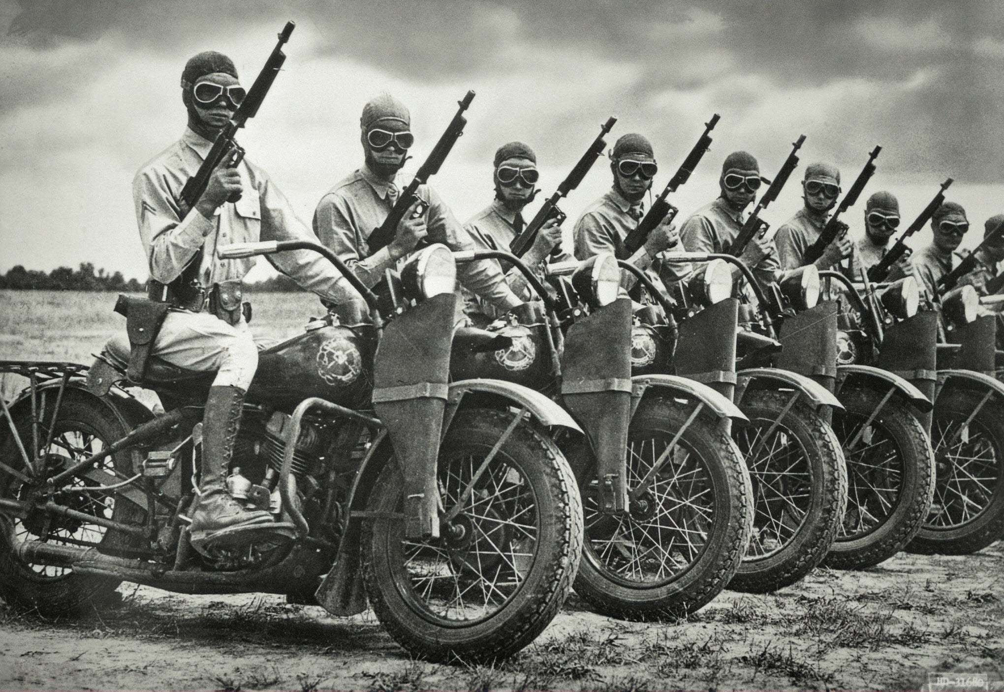 Row of mounted soldiers on Harley Davidson motorcycles (U.S. Army Armored Division contingency) World War II, 1942.jpg