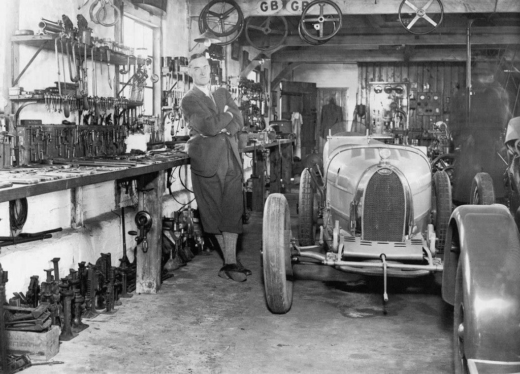 Sir Malcolm Reynolds next to a Bugatti in the 1920's.jpg