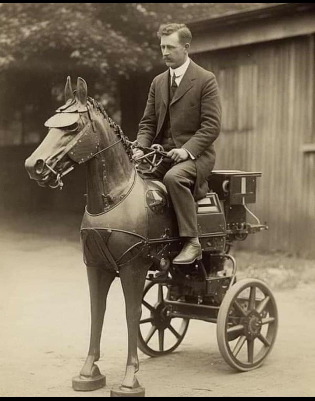 Prototype of a horse-drawn carriage motorcycle, early 1900's.jpg