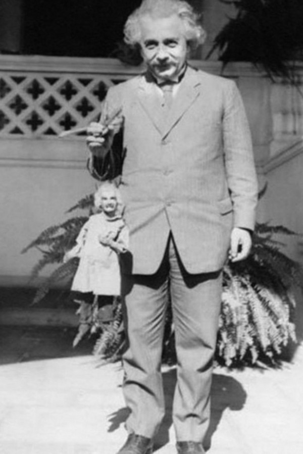 Albert with his puppet, circa 1930's.jpg