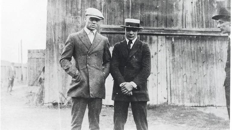 Heavyweight champion Jack Dempsey with Middleweight champion Harry Greb, 1920.jpg
