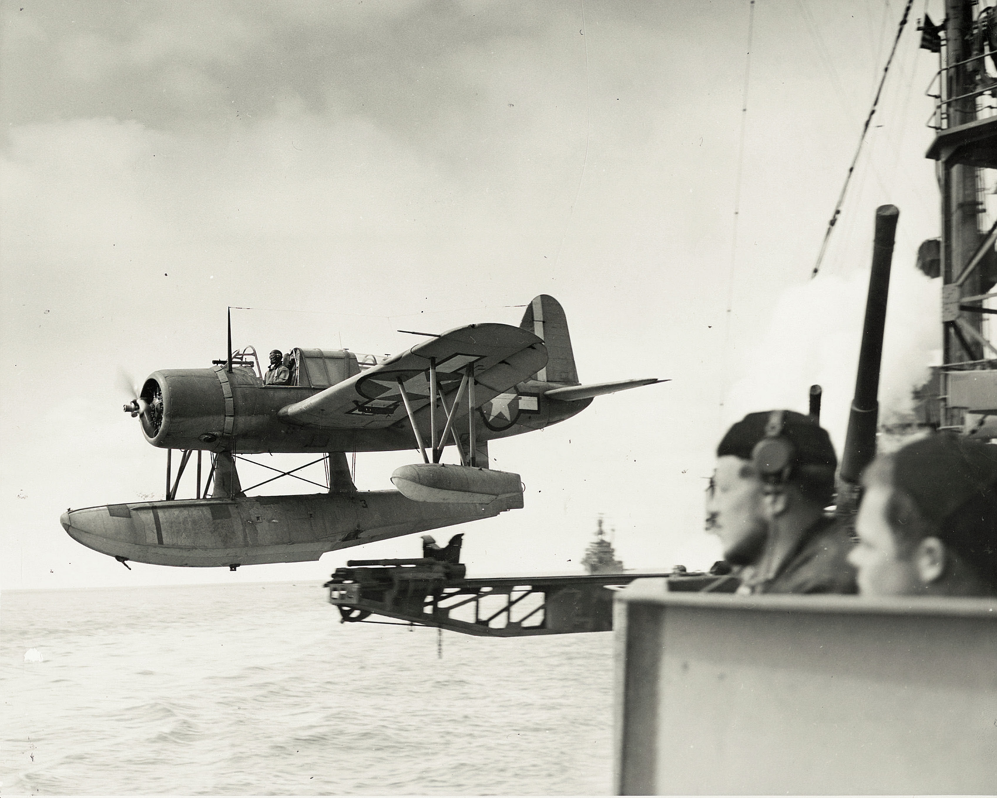 Lieutenant Steve Corneliussen taking off in a catapult launched reconnaissance floatplane Vought OS2U-3 Kingfisher, 1940s.jpg