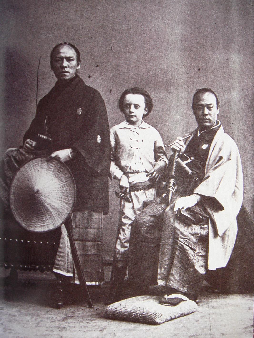 A young Paul Nadar (french photographer) poses with his own sword alongside 2 samurai in 1863, photo taken by his father, Nadar.jpg