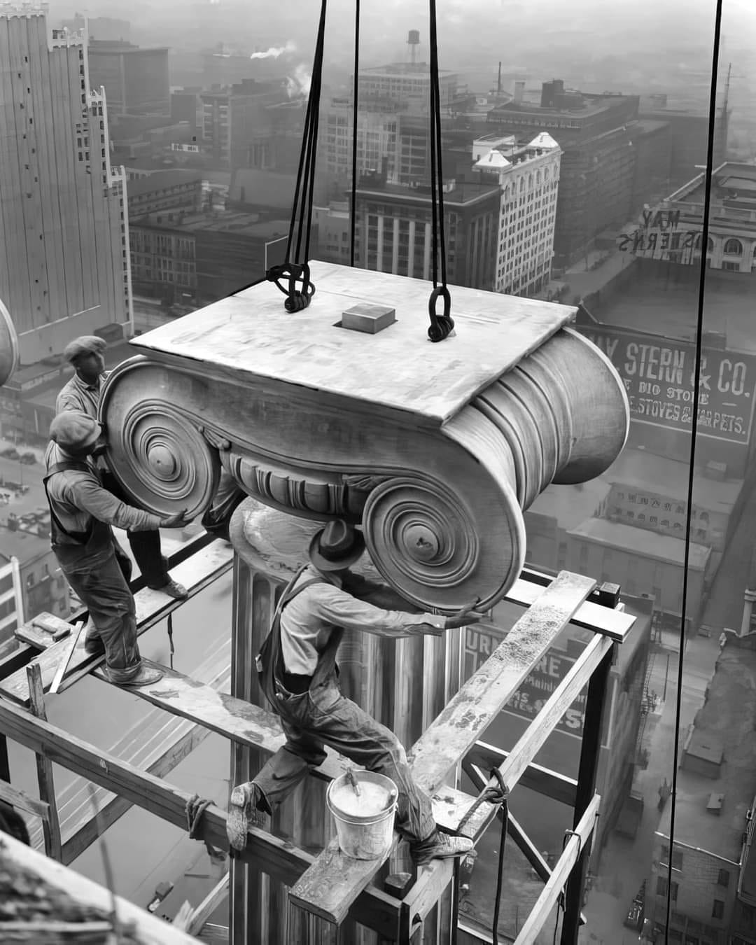 c. 1929 Workers install a Greek Revival architectural column on the Civil Courts building in St. Louis, Missouri.jpg