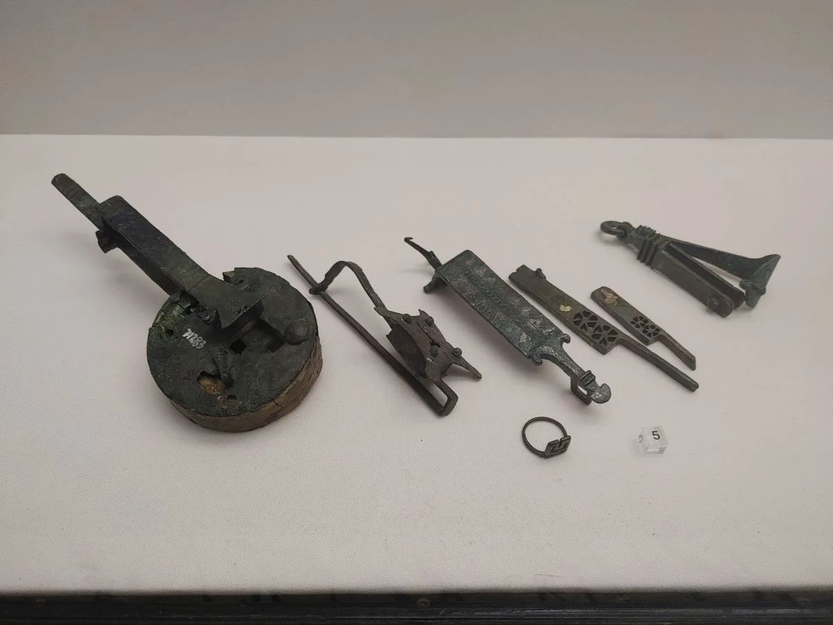 Roman locks that were discovered in cities destroyed by Vesuvius in 79 CE. The objects are made of bronze and date back to the 1st century CE. The artifacts are in the National Archaeological Museum in Naples.jpg