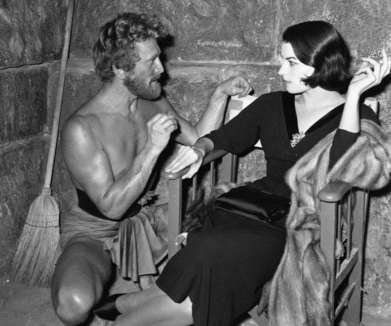 Kirk Douglas and Silvana Mangano take a break during the shooting of Ulysses (1954).jpg