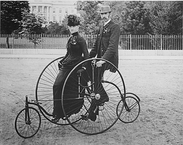Couple on a two person bicycle, 1886.jpg