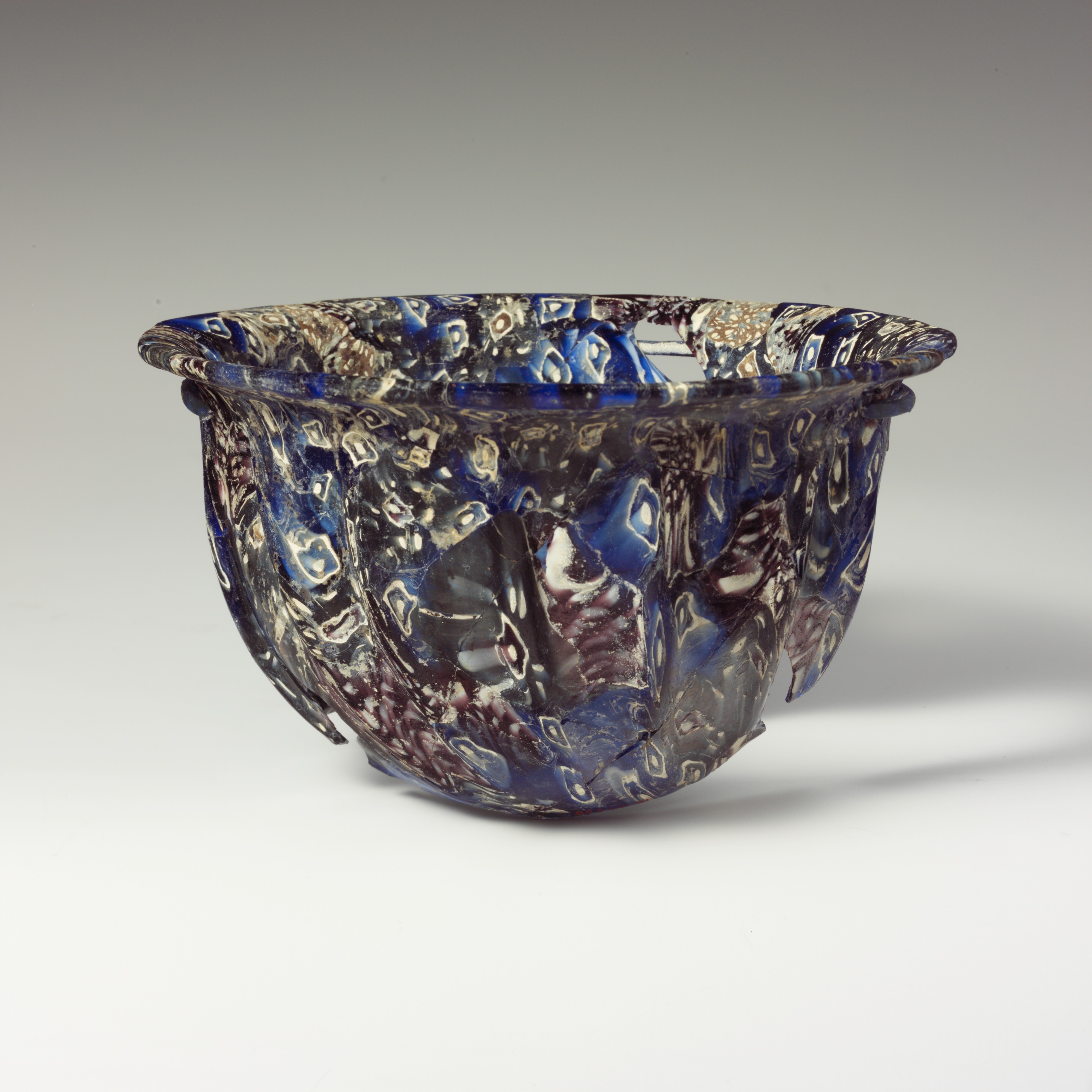 Ancient Roman ribbed mosaic glass bowl, late 1st century BCE–early 1st century CE..jpg