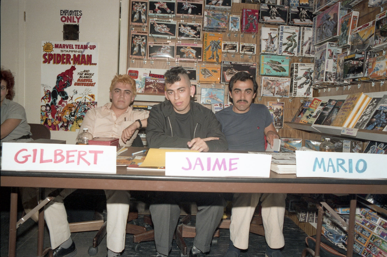Gilbert, Jamie and Mario Hernandez at a 1984 comic-book signing.png