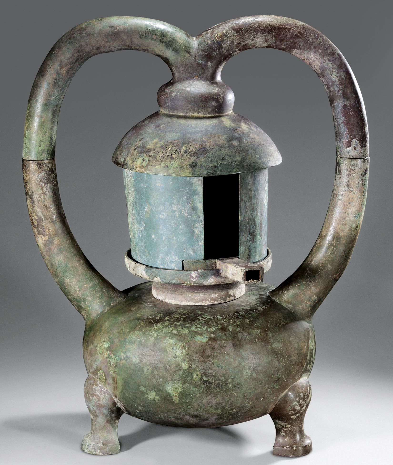 Bronze lamp with turnable shutter. China, Han dynasty, 2nd century BC.jpg