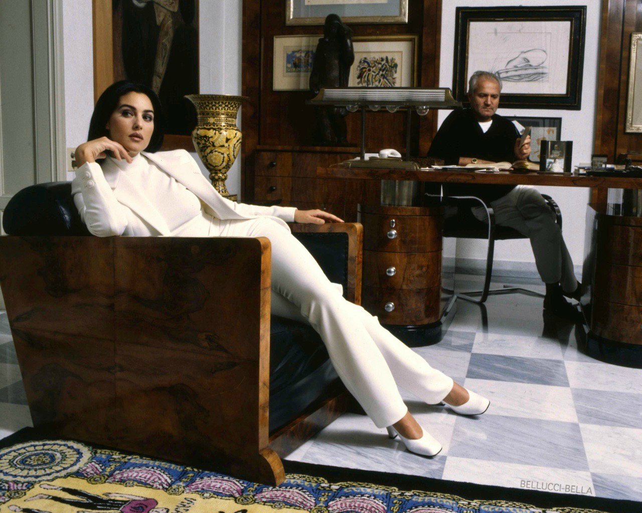 Monica Bellucci with Gianni Versace by Jean-Marie Perier, 1995.png