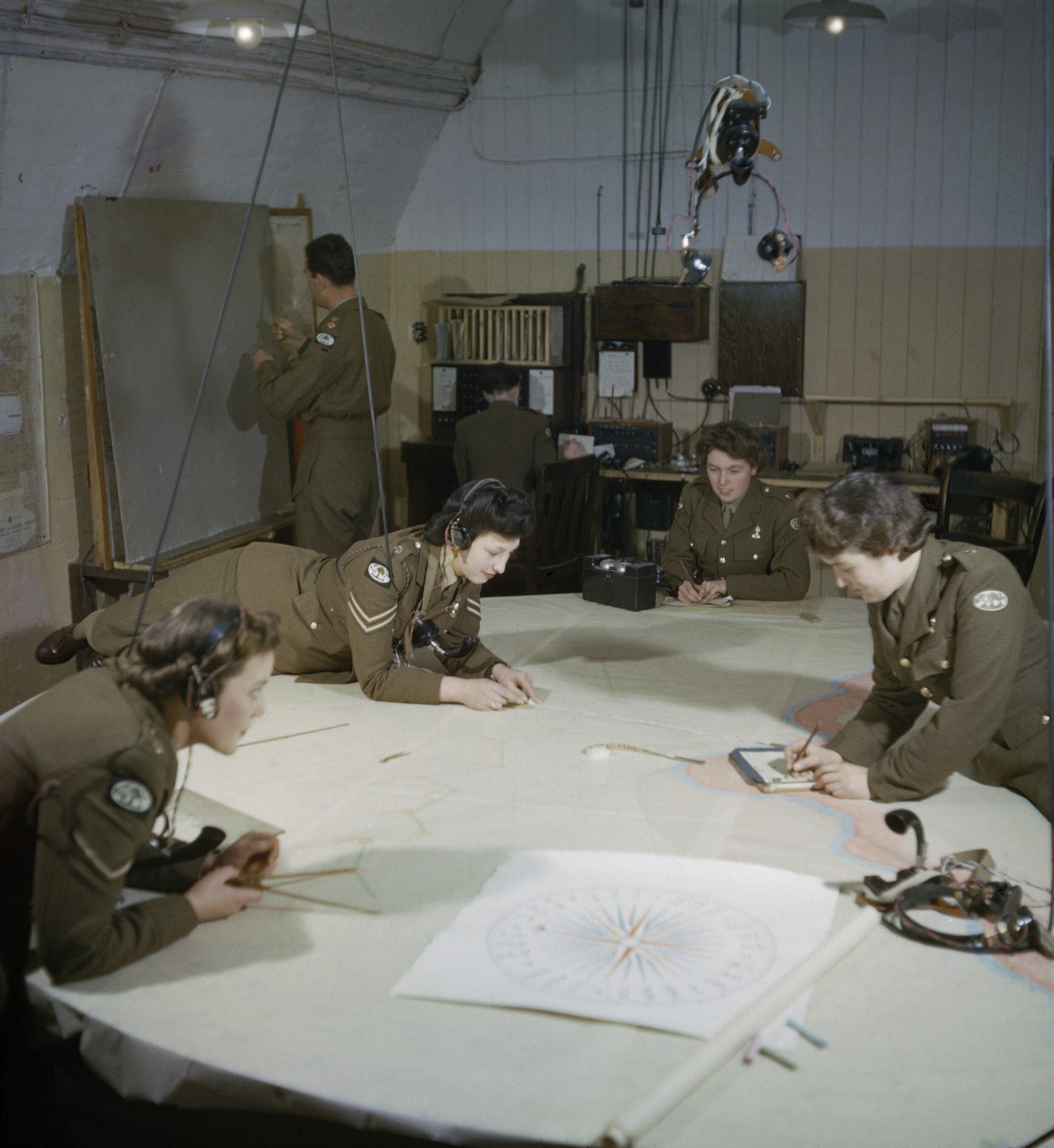 Auxiliary_Territorial_Service_plotters_at_work_at_428_Battery,_Coastal_Defence_Artillery_Headquarters,_Dover,_December_1942.jpg