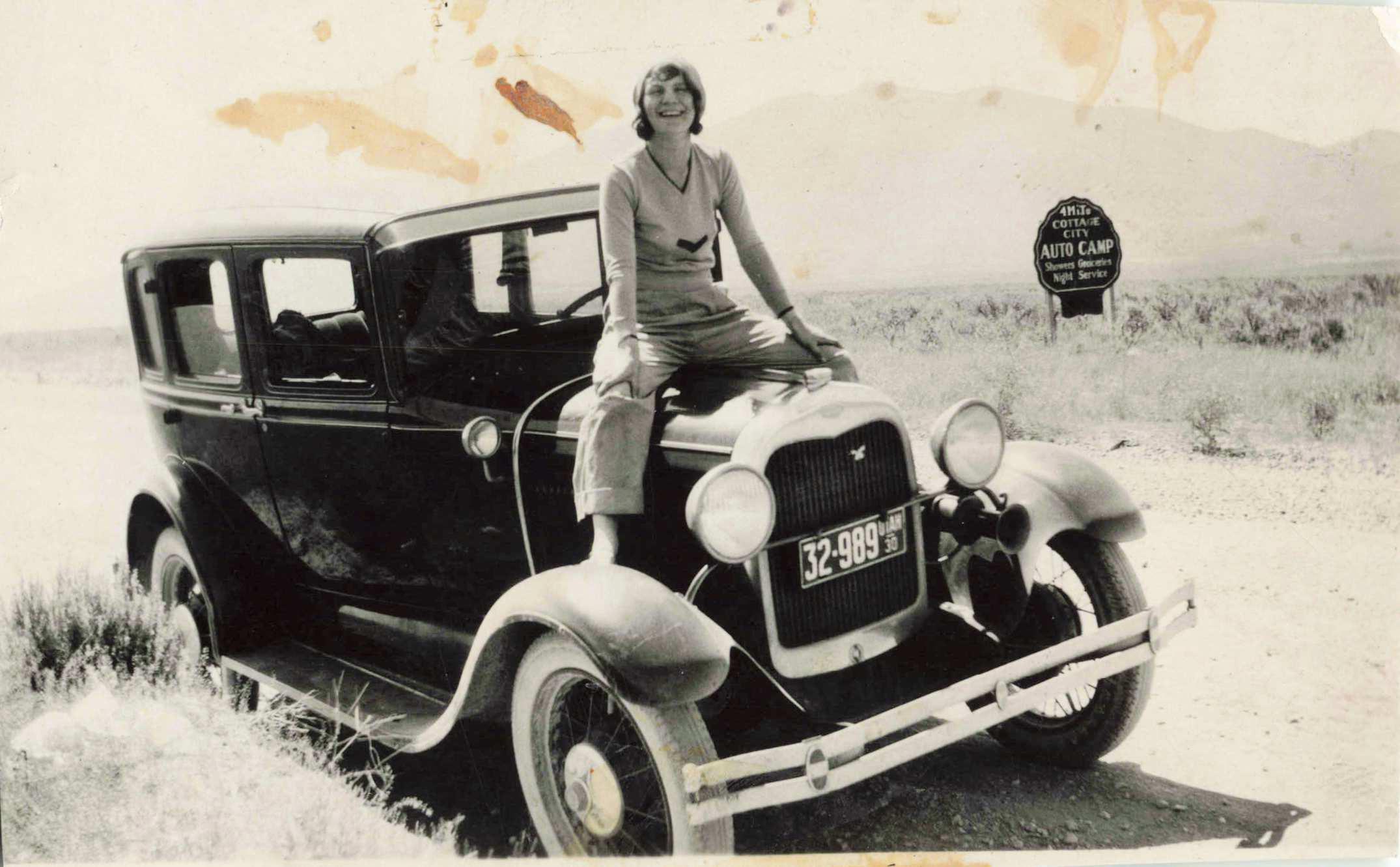 Up on the car hood, 1930s.jpg