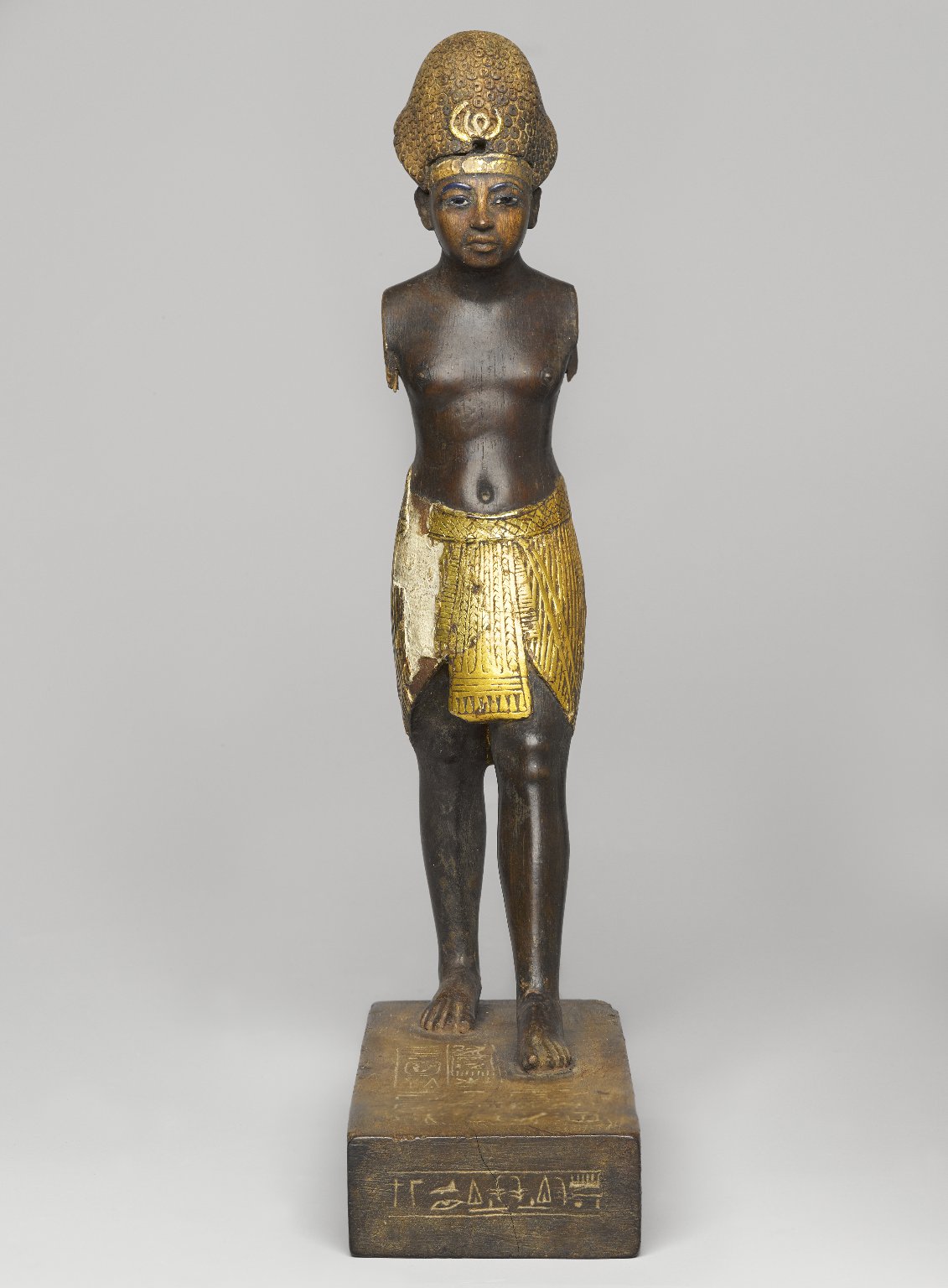 Wooden statuette of Amenhotep III with gold leaf, glass and pigment. New Kingdom Egypt, 18th dynasty, ca. 1390-1352 BC. Brooklyn Museum collection.jpg