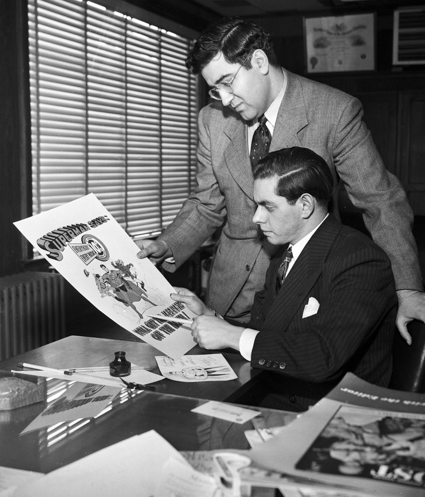 Shuster (seated) with Jerry Siegel in 1942.jpg